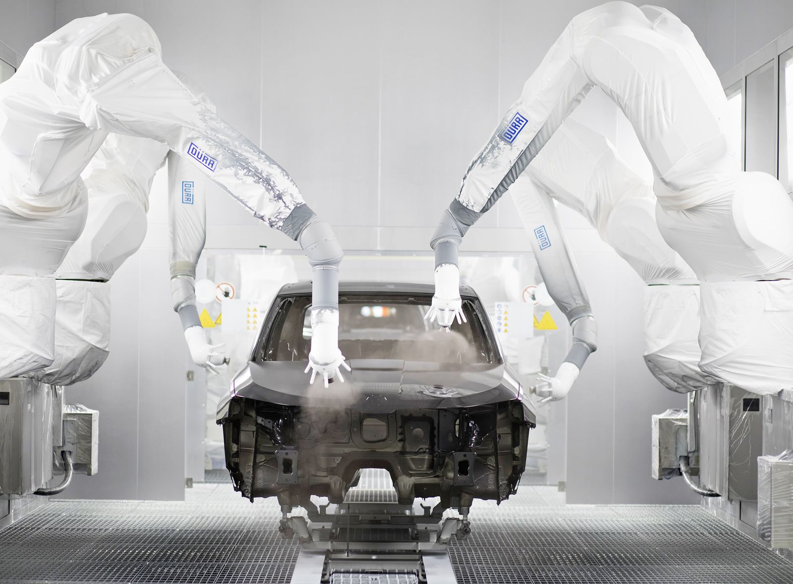 Latestgeneration painting robots for electric vehicles Dürr Universal